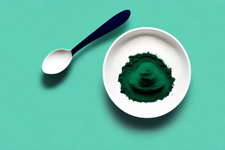 A bowl of spirulina powder with a spoon